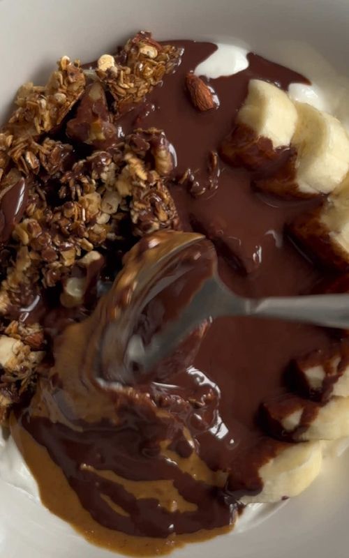 Chocolate Banana Chia Yogurt Bowl with Peanut Butter and Homemade Pan Granola